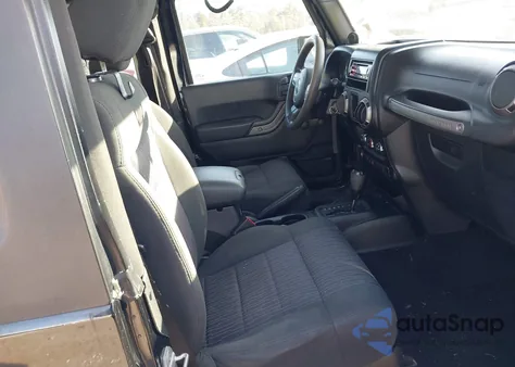 2011 Jeep Wrangler Sport z USA, uszkodzony, nr VIN 1J4AA2D19BL548560